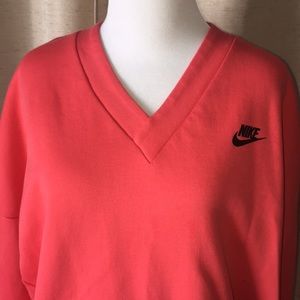 Nike Coral pull over sweatshirt.
